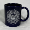 Blue coffee mug with Stockbridge Seal printed in white
